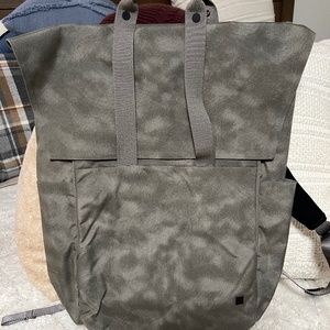 Lululemon Backpack w several pockets and laptop sleeve.